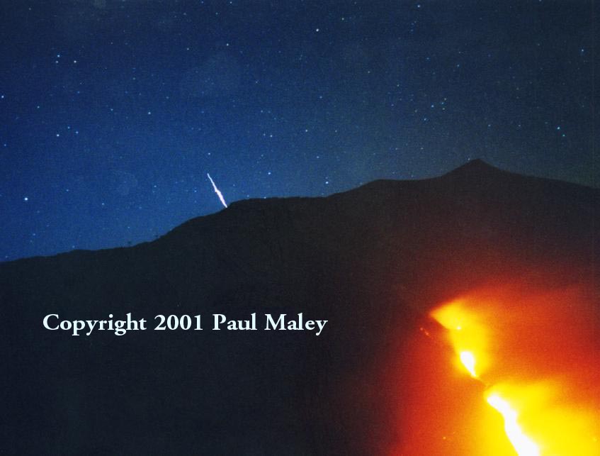 An Iridium satellite flares over Mt.Etna during a volcanic eruption!