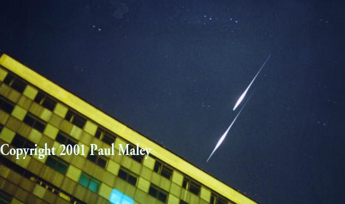 Two Iridium satellites fly over a Moscow apartment building!