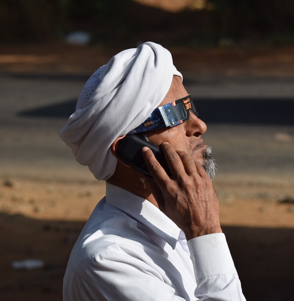 Local Imam enjoying the Annual Eclipse of the sun in India 2019